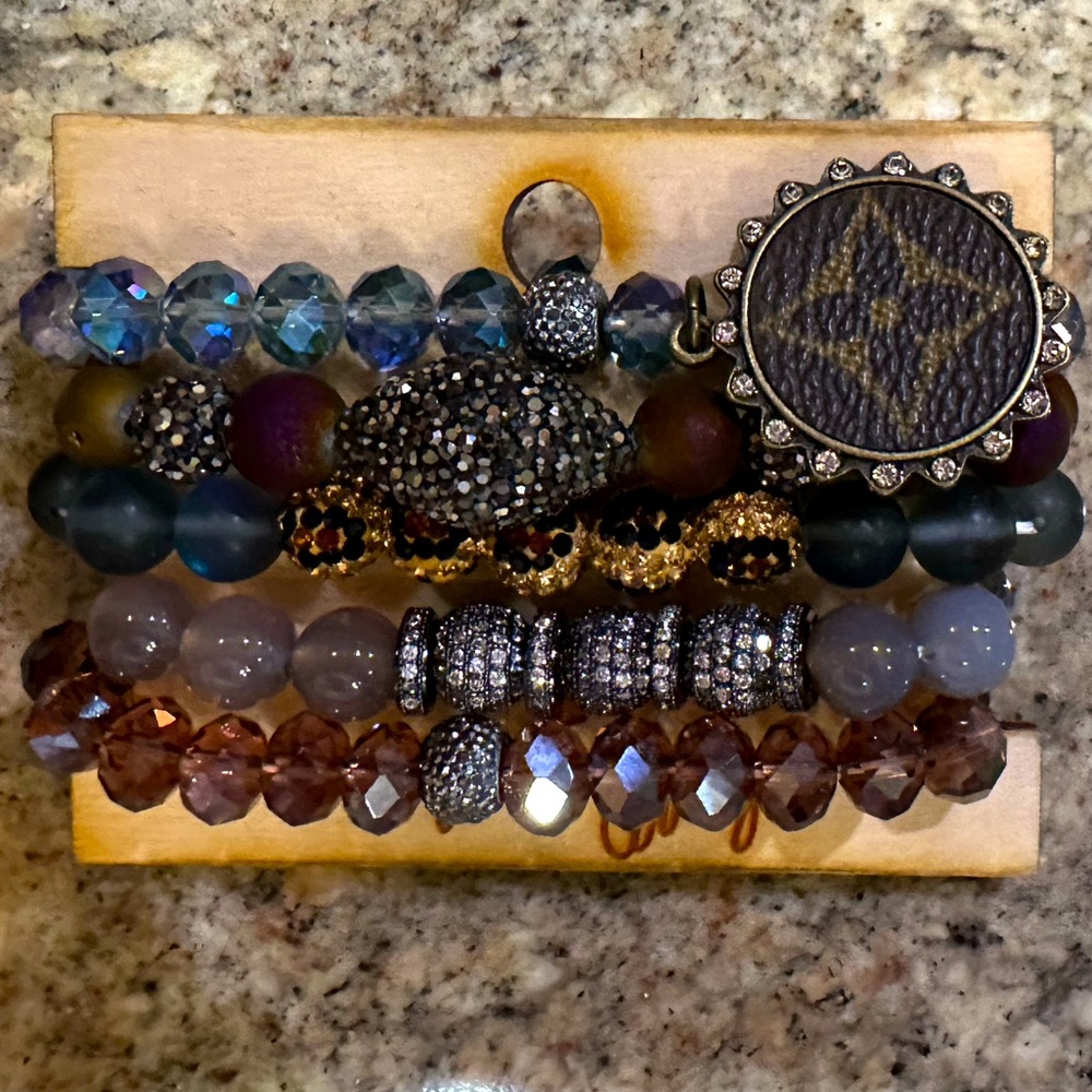 Bracelets with upcycled charm